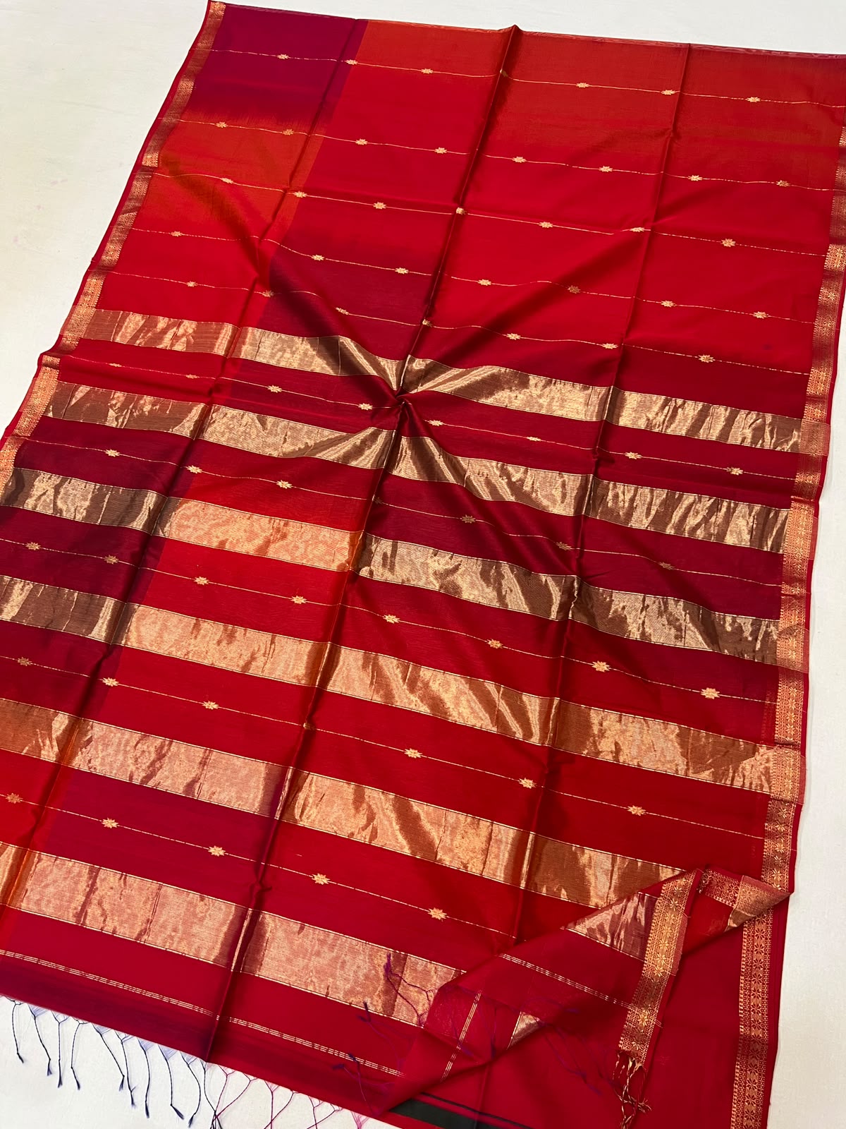 Trending Red Shaded & Golden Zari Striped with Star Buti Maheshwari Handloom Saree